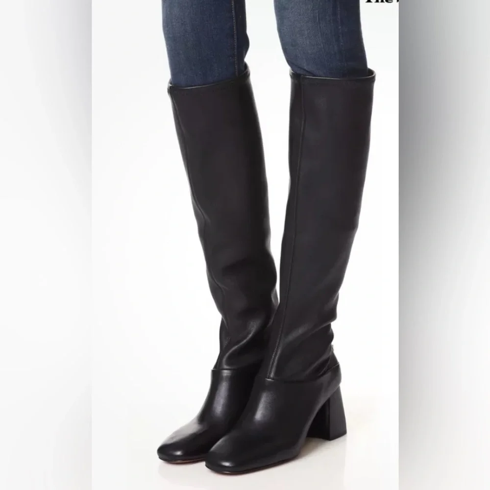Tory Burch Black Sidney Leather 70mm Knee Boot. Stacked heel. Metal heel logo. 7